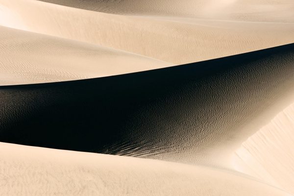 A detail of Mesquite dunes in Death Valley under early morning light