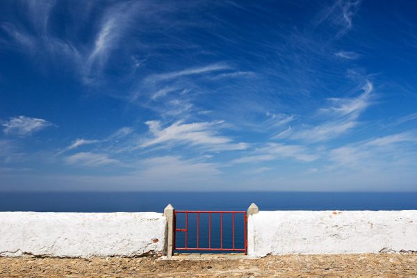 Abstract view of a gate in front of the ocean