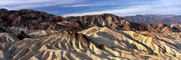 Panoramic view of Zabriskie point at sunrise Death Valley