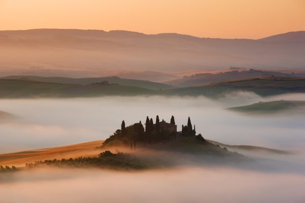 Foggy sunrise in val d'Orcia Tuscany