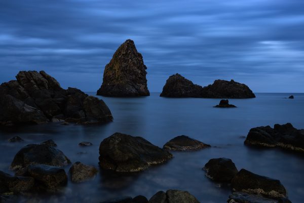 Night view of the Cyclops in Aci Trezza Sicily